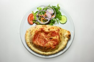 Pizza med stegte svampe og urter